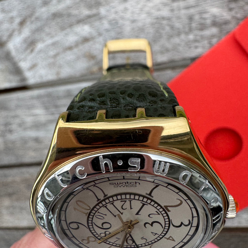 Swatch Irony Big RENVERSE YGG100, elegant vintage stainless steel