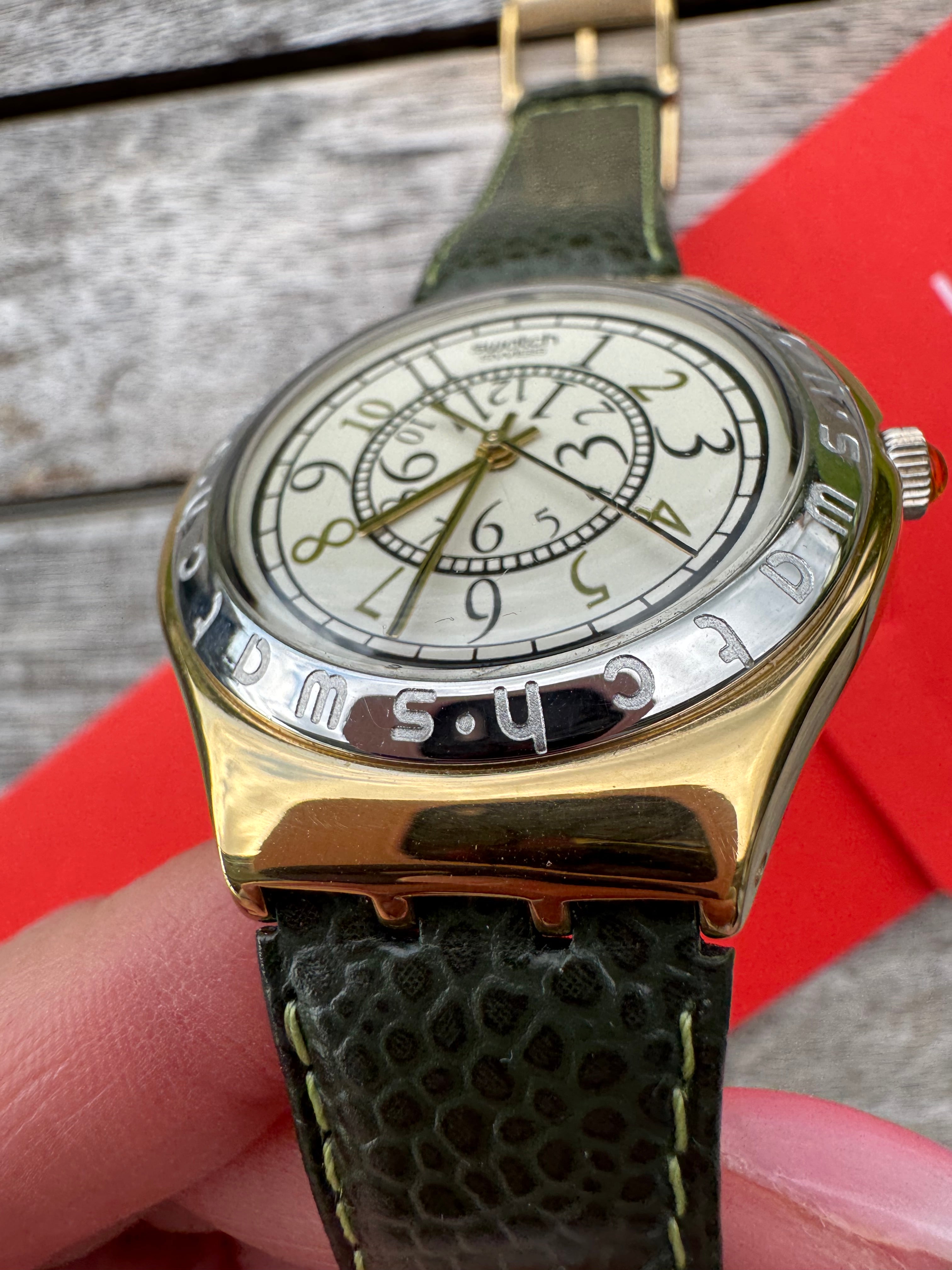 Swatch Irony Big RENVERSE YGG100, elegant vintage stainless steel