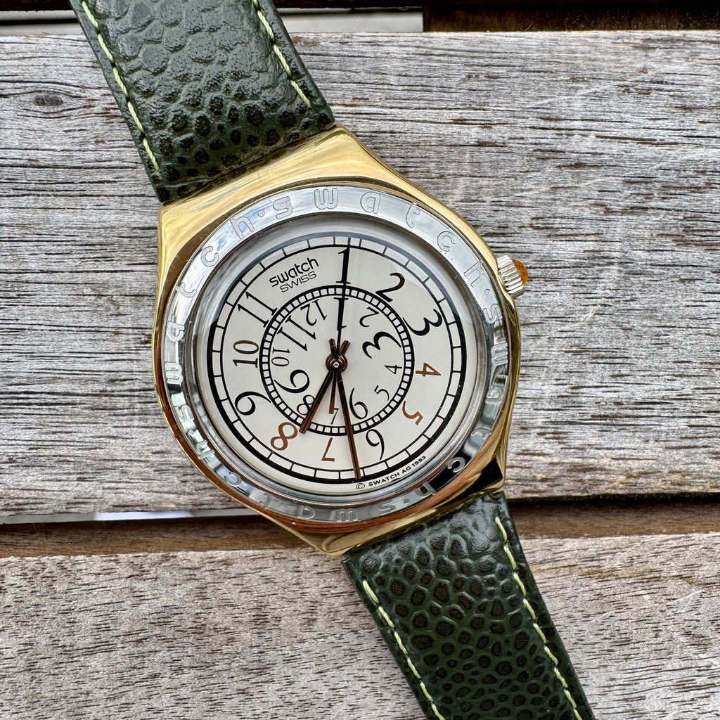 Swatch Irony Big RENVERSE YGG100, elegant vintage stainless steel