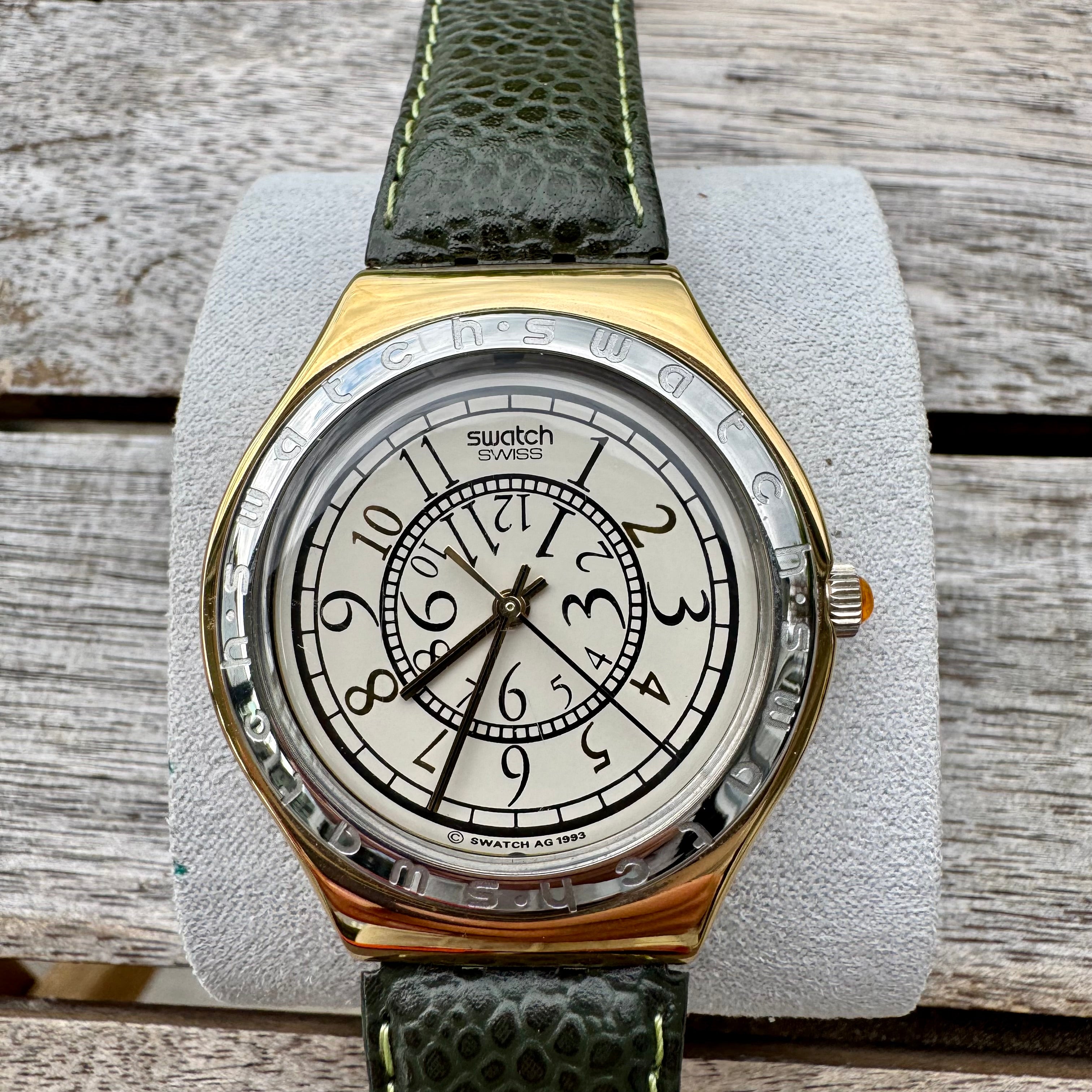 Swatch Irony Big RENVERSE YGG100, elegant vintage stainless steel